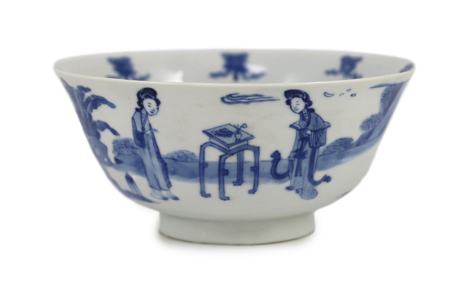 A Chinese blue and white ‘ladies’ bowl, Kangxi period, 15.5cm diameter, wood stand